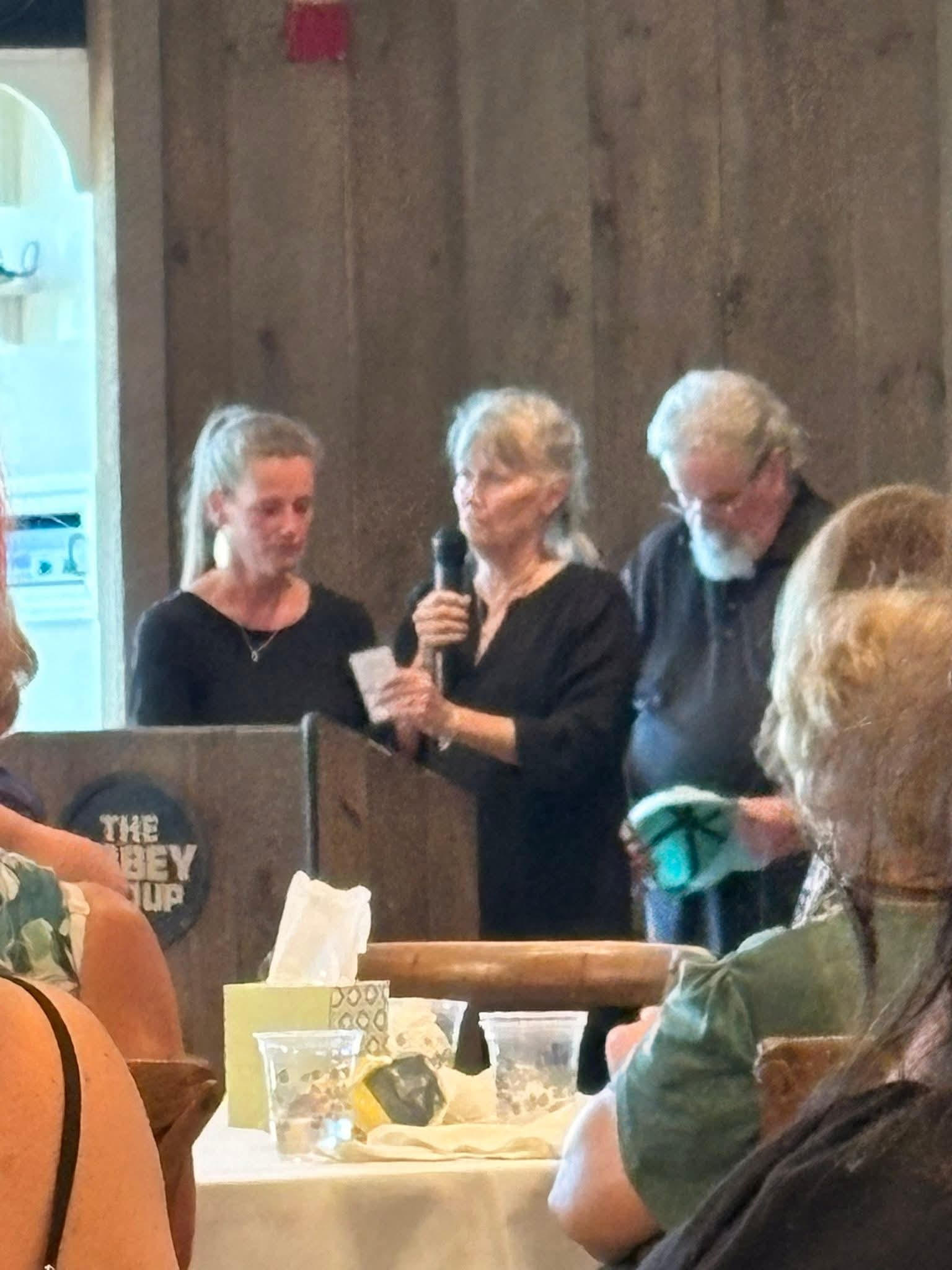 Maria Carlson Noel with her mom and dad at church.