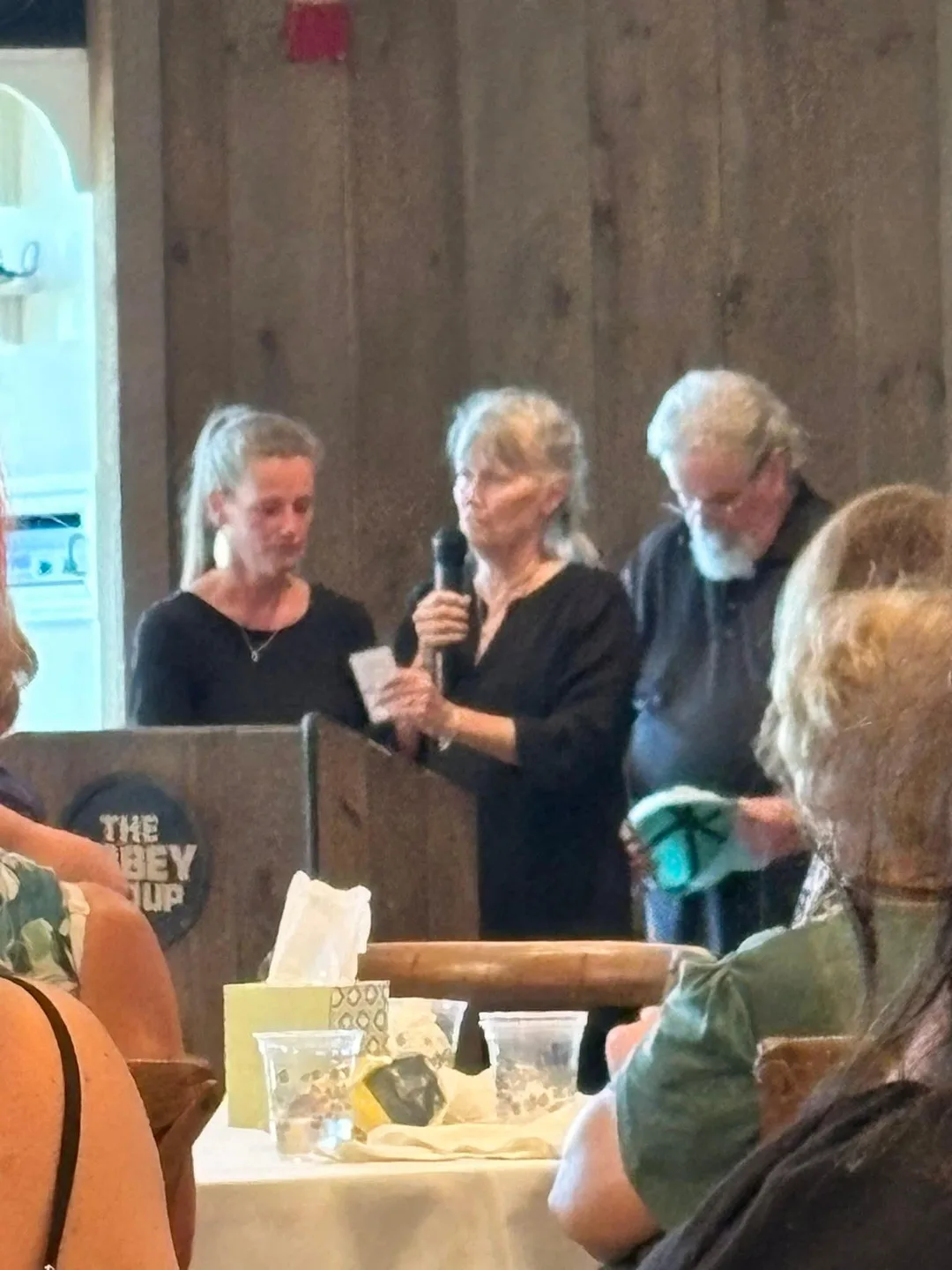 Maria Carlson Noel with her mom and dad at church.